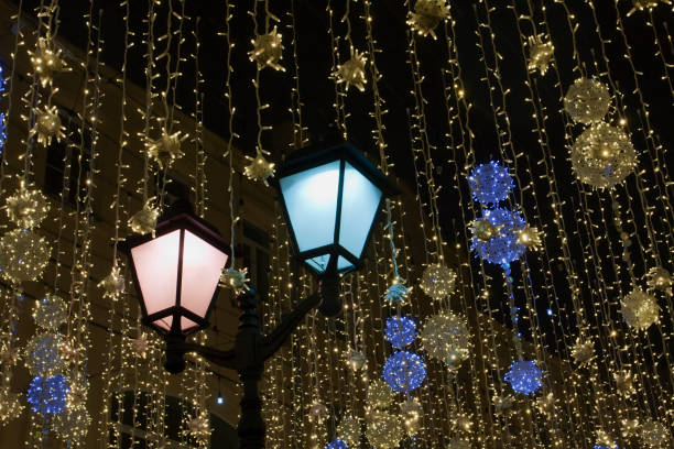 istock Street lamp surrounded by garlands. 1097032432