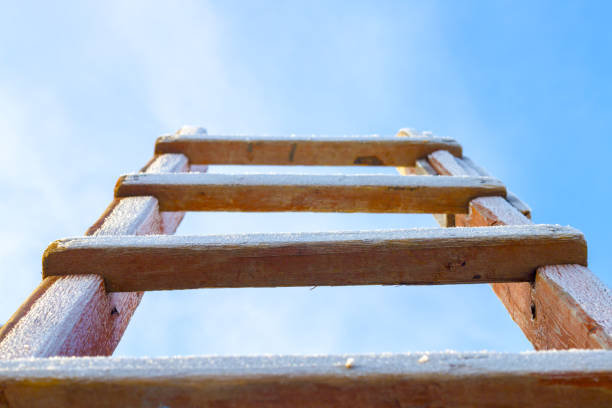 istock winter stairs in sky snow covered 1097038896