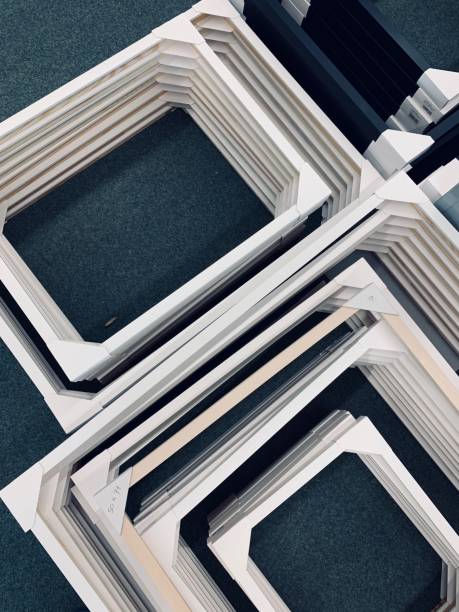 istock Stack of wooden picture frames from above 1097039082