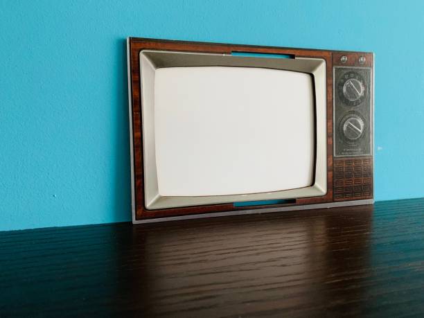istock Vintage TV screen on blue background 1097039596
