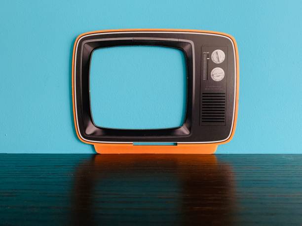 istock Vintage TV screen on blue background 1097039784