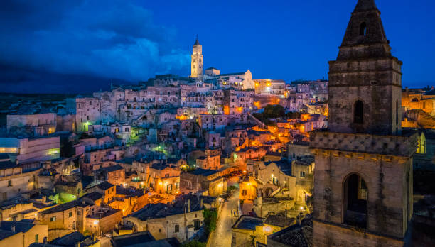 Scenic night sight of the "Sassi district" in Matera, Basilicata, southern Italy. Scenic night sight of the "Sassi district" in Matera, Basilicata, southern Italy. murge photos stock pictures, royalty-free photos & images