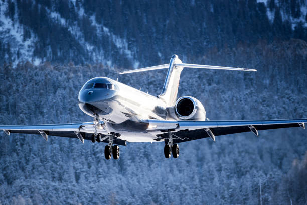 business jet - airfield mountain snow airport foto e immagini stock