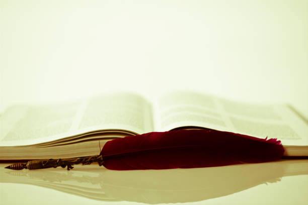 istock an old book and a red pen 1097047506