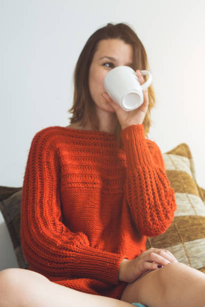 istock Cute caucasian girl drinking coffee 1097057458