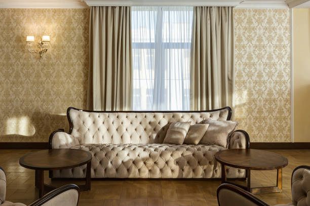 istock Classic interior of room with beige sofa. 1097057660