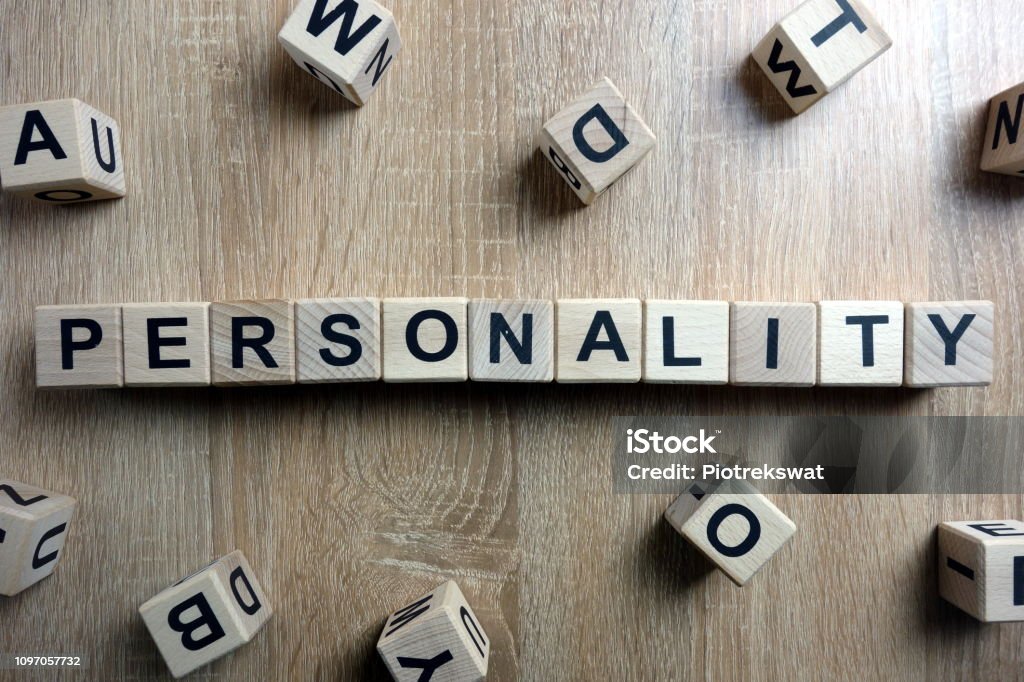Personality word from wooden blocks Personality word from wooden blocks on desk Individuality Stock Photo