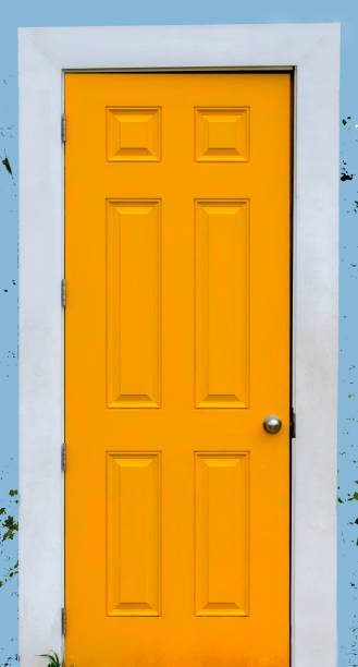 istock Front view of rustic wooden orange door 1097061780