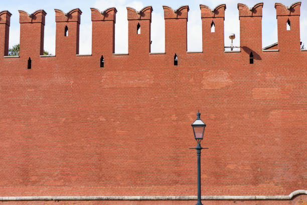istock Red Kremlin wall at the autumn day 1097061842