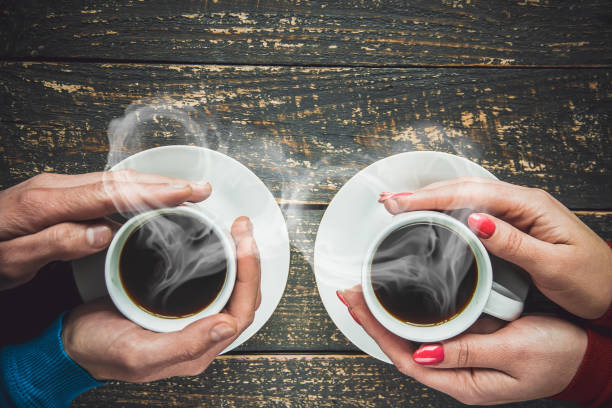 istock Cup drink for Breakfast in the hands of lovers. Selective focus. 1097063080