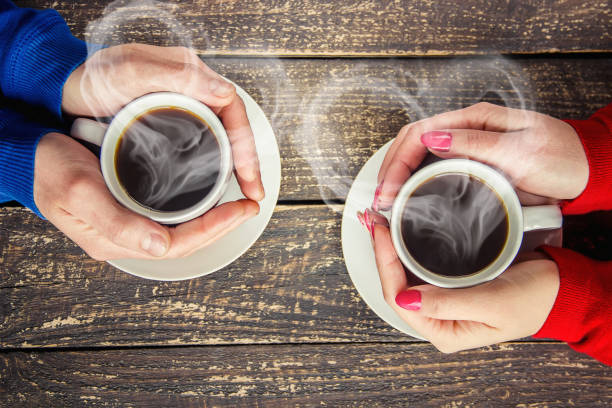 istock Cup drink for Breakfast in the hands of lovers. Selective focus. 1097063082