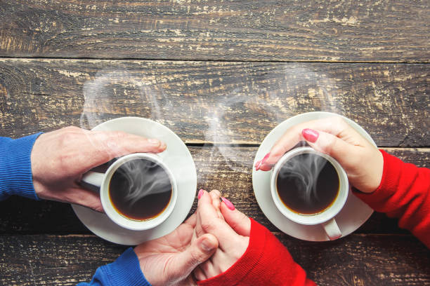 istock Cup drink for Breakfast in the hands of lovers. Selective focus. 1097063106