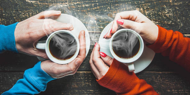 istock Cup drink for Breakfast in the hands of lovers. Selective focus. 1097063116