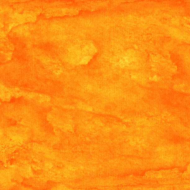 istock Orange watercolor background with texture paint and paper 1097068786
