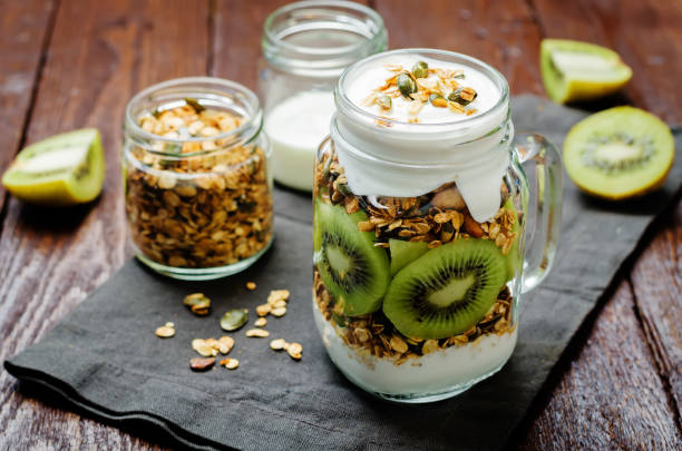 istock Greek yogurt granola kiwi breakfast in jar 1097071928