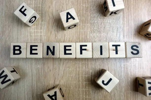 Photo of Benefits word from wooden blocks