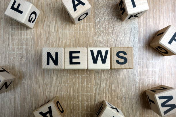 istock News word from wooden blocks 1097082728