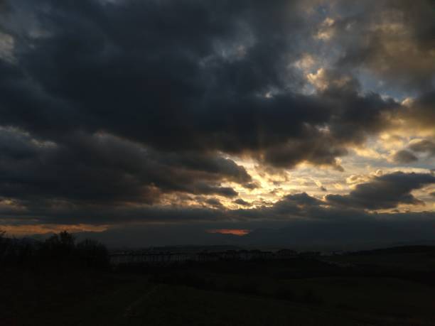 Sunset and sunrise with dramatic colorful clouds. Slovakia