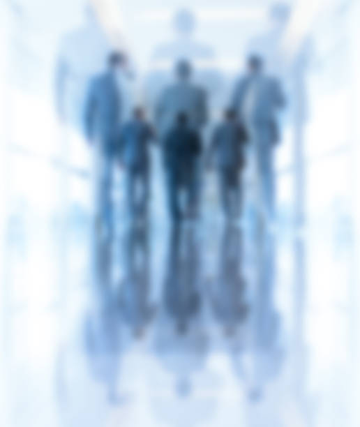 istock Abstract: Three arab business men walking, talking, meeting 1097094866