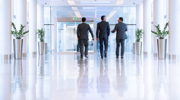 istock Three arab business men walking, talking, meeting 1097095016