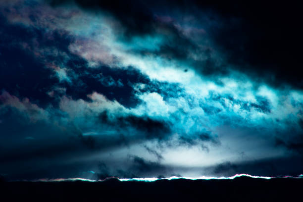 istock horror clouds in the sky at full moon 1097095780