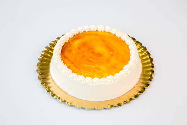 istock egg cake on a gold tray on white background 1097096680