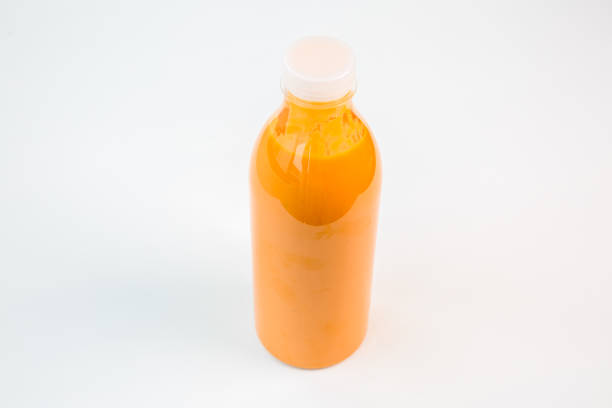 istock natural orange juice in a plastic bottle 1097098830