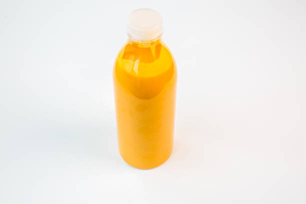 istock natural orange juice in a plastic bottle 1097098888
