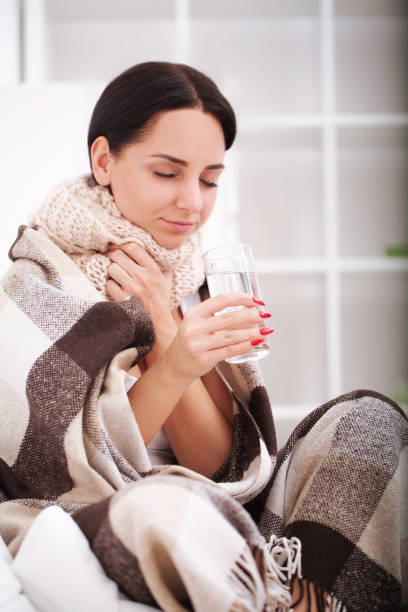 istock Sick Woman with Thermometer. Flu. Woman Caught Cold 1097110316