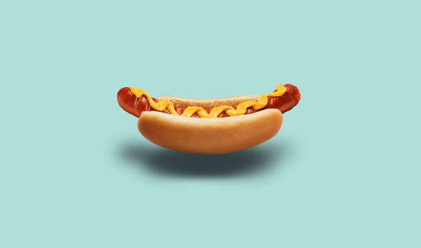 fresh american hot dog with mustard stock photo