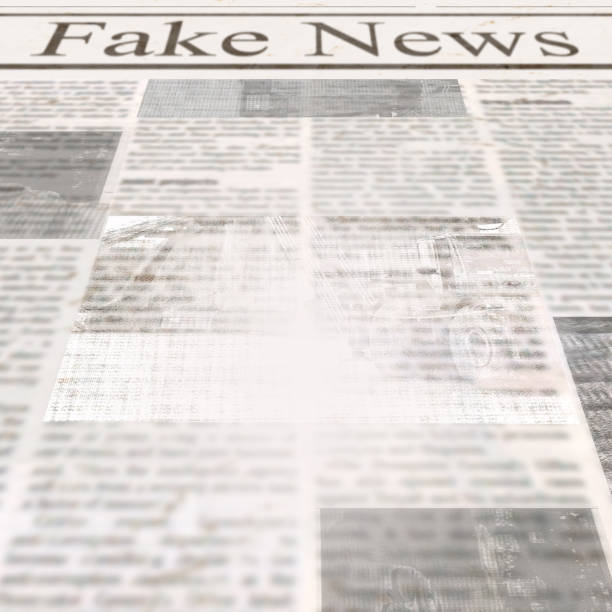 istock Newspaper with headline Fake News and old unreadable text 1097123760