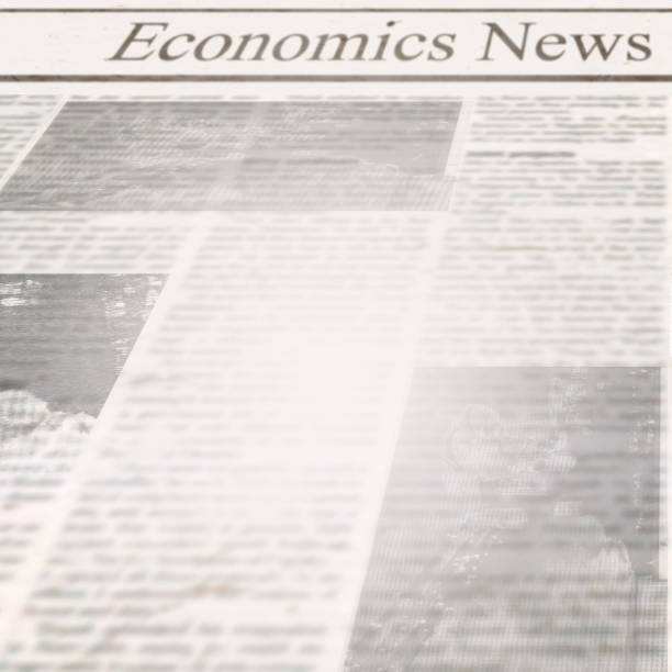 istock Newspaper with headline Economics News and old unreadable text 1097123770