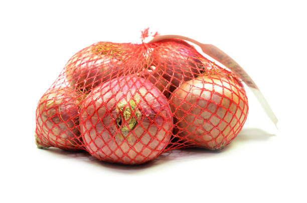 istock Pack of red onions isolated 1097125750