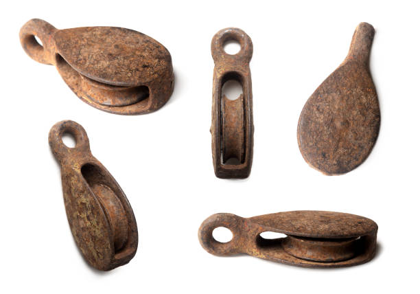 5 different views of a rusty antique pulley
