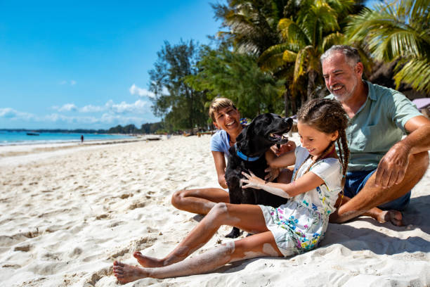 Family on Tropical Vacations With a Dog
