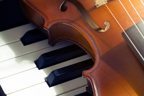 istock Piano keyboard with violin,top view 1097157076