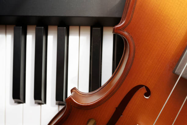 istock Piano keyboard with violin,top view 1097158224