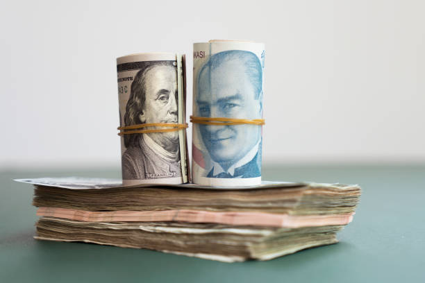 Turkish Liras And US Banknotes stock photo