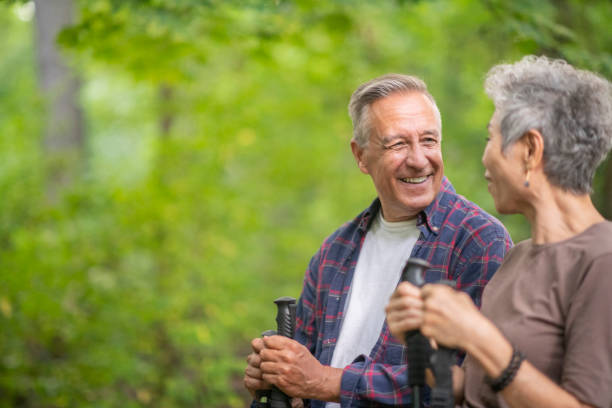 istock Senior man smiling at his wife 1097160430