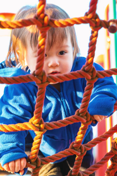 istock Toddler boy playing at the playground 1097161962
