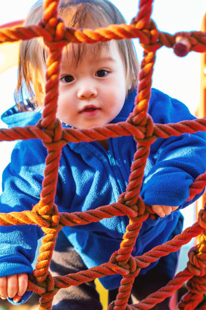 istock Toddler boy playing at the playground 1097161976