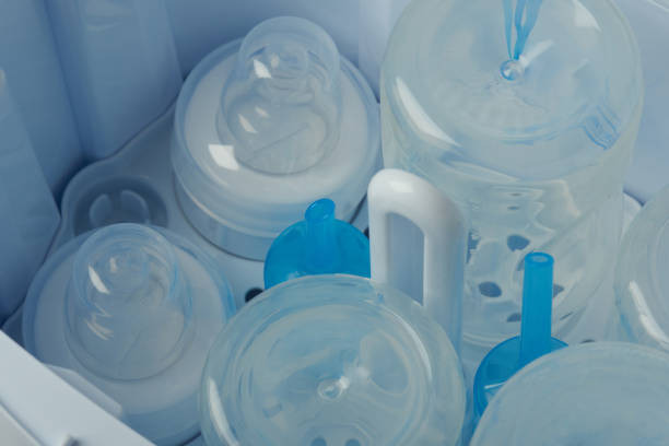 istock Cleaning plastic bottle feeding parts 1097166548
