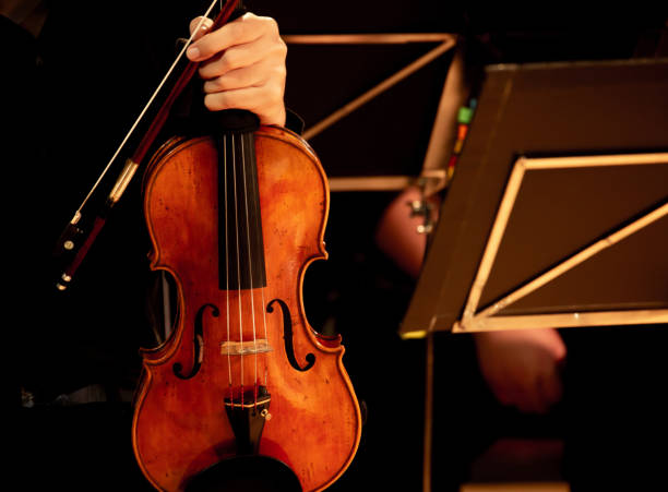 istock Musicians are playing the violin. 1097174372