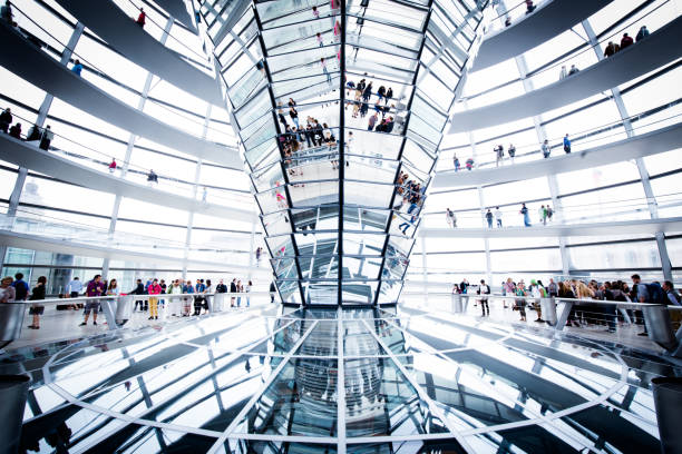 Berlin Reichstag Dome, Germany BERLIN - JULY 19, 2015: Interior view of famous Reichstag Dome in Berlin, Germany. Constructed to symbolize the reunification of Germany it's now one of Berlin's most important landmarks. the reichstag stock pictures, royalty-free photos & images