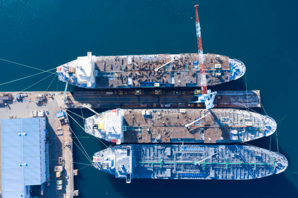 istock A large ship under construction is floating in the sea. 1097179700