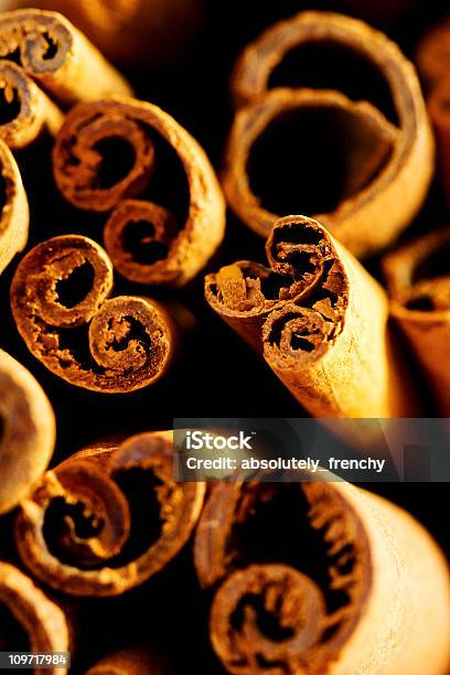 Macro Shot Of Cinnamon Sticks In A Pile Stock Photo - Download Image Now - Cinnamon, Brown, Canella