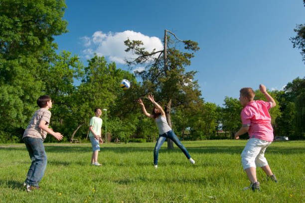 Teenagers having fun outdoors on a sunny spring day.