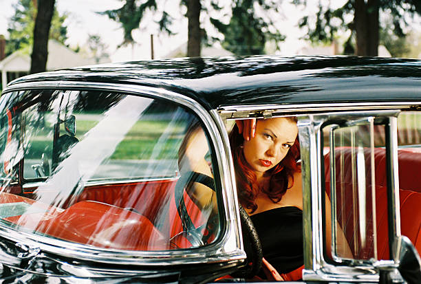 istock Young Woman in Retro Car 109718330