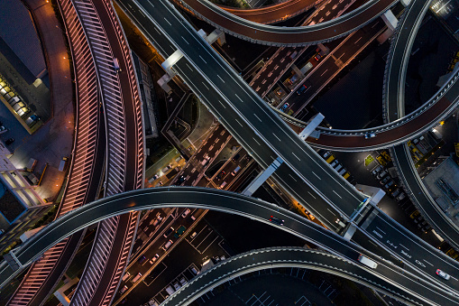 Night photograph of complicated intersecting highway.