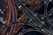 Night photograph of complicated intersecting highway.